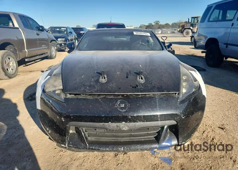 2009 Nissan 370Z z USA, uszkodzony, nr VIN JN1AZ44EX9M403788